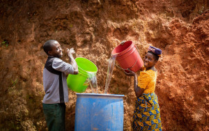 Couple with plastic buckets